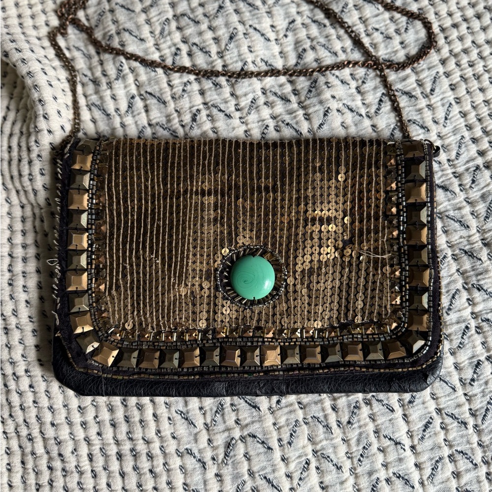 Elegant Gold and Black Sequin Clutch